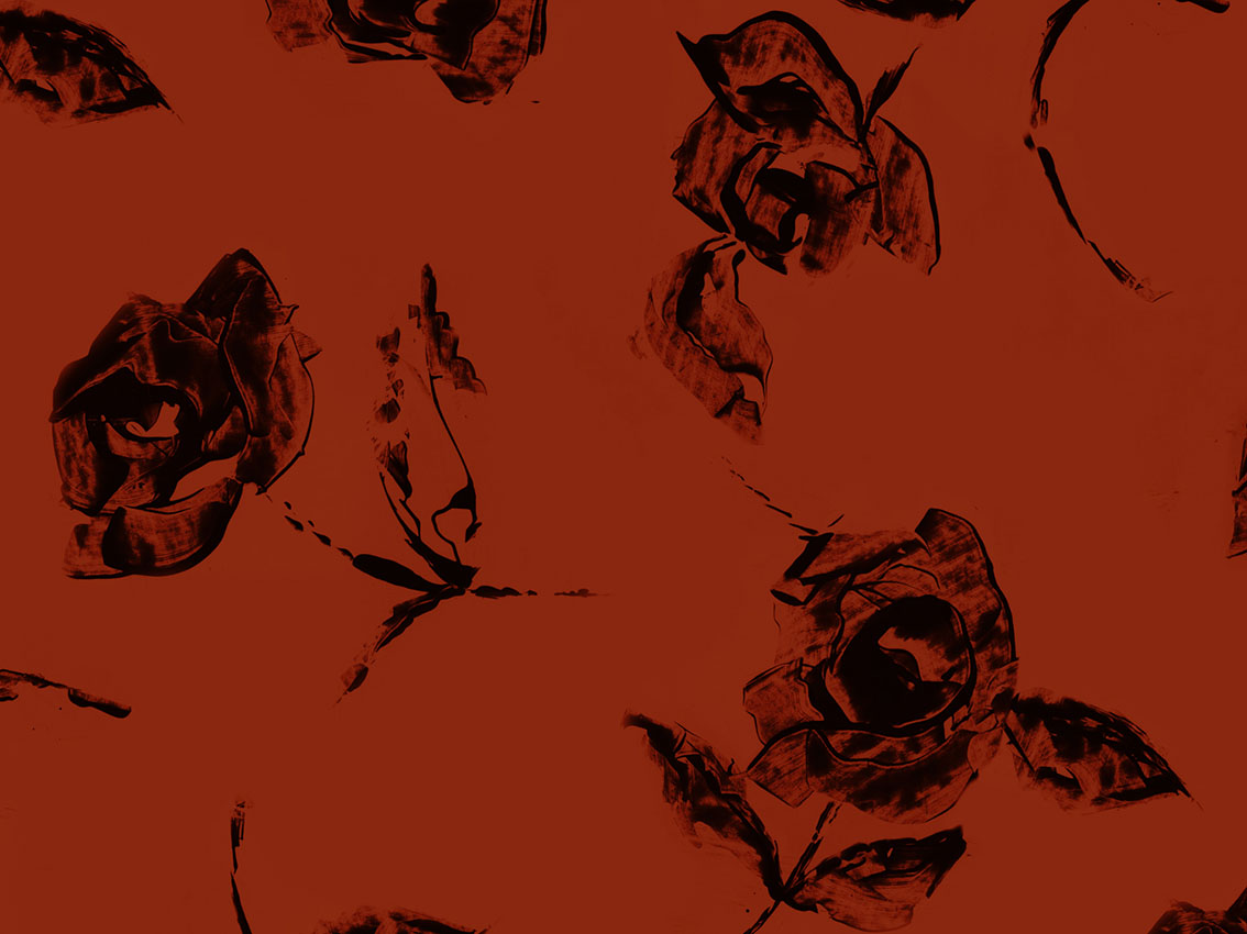 disegno artistico di fiori su tessuto rosso